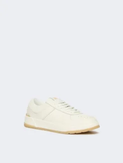 Low-top trainers in tumbled leather - WHITE